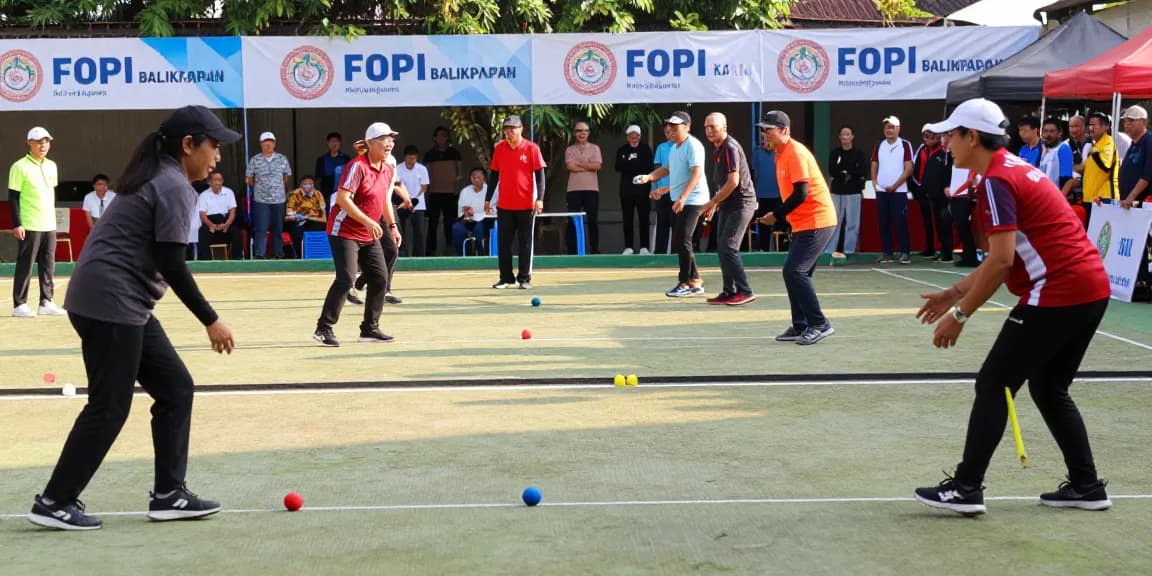 Participants enjoying a vibrant petanque match at fopikotabalikpap.org event.